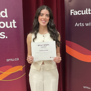Jessica is a white woman with long brown hair. She holds her Dean's List certificate.