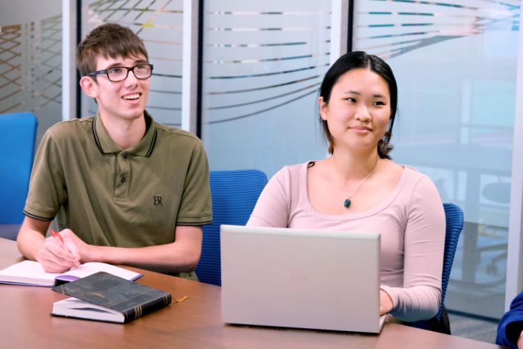 Student Smiling and listening