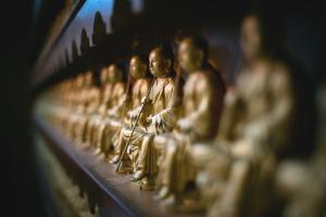 Line of golden buddha statues