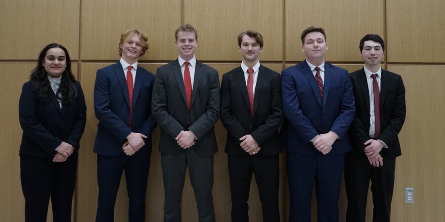 IMPACT Fund Managers standing for a group photo.